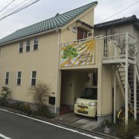 Outside. Restaurant is on the second floor, use the stairway on the right at Grains in Nagoya