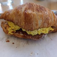 Vegan brunchy sandwich on croissant at The Sweet Praxis in Syracuse