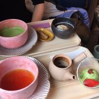 Matcha tea with biscuits and a red bean soup up the top, black Japanese tea with vegan gelato at the bottom.  at Onwa in Nara