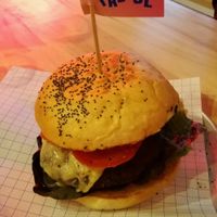 vegan burger with pumpkin pattie and vegan cheese at Palace in Mount Maunganui