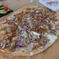 Veganer Flammkuchen "Als Holzfäller" at Henry's Bistro in Ingelheim