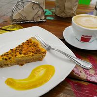 Cheesecake Maracuyá and Cafe Latte with Almond Milk at Sapiens in Santiago