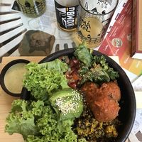 Buddha balls: Albóndigas de lentejas con salsa de tomate, arroz de coliflor a la curcuma con quinoa roja, kale asado, palta, tomate, hojas verdes, acompañado de salsa de cilantro at Sapiens in Santiago