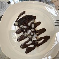 Chocolate Cake with coconut flakes at Sapiens in Santiago