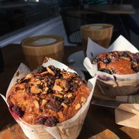Vegan chocolate/raspberry and blueberry muffins + latte with coconut milk at George Cafe in Mount Maunganui