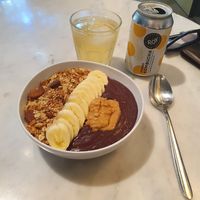 Açai bowl with granola, banana and peanut butter at My Goodness in Berlin