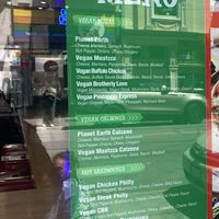 Upon Arrival w/Vegan Menú on Window Displayy  at Bizza in San Francisco