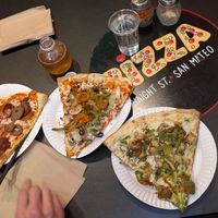 Vegan Meatzza, Planet Earth, and Vegan Don't Be a Chicken ($8.25 per slice) at Bizza in San Francisco