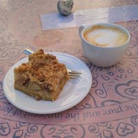 Apple pie and a cappuccino with oat milk at Maghaz Restaurant and Teahouse in Budapest