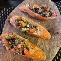 The bruschetta was juicy and tasty at La Silapa in Luang Prabang