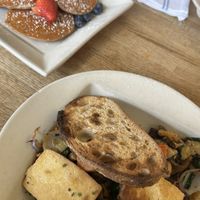 Farmer’s Daughter and Banana Pancakes. Pancakes give you access to the pancake bar with extra toppings like fruit and nuts.   at Portage Bay Cafe - Ballard in Seattle