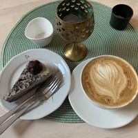 Liquorice cake & oat cappuccino  at Truefood Cafe in Lund