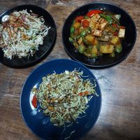 2 spicy salads and 1 stir-fried eggplant with potatoes. at The Swan Burmese Cuisine in Chiang Mai