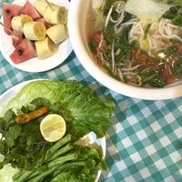 Glass noodle soup + free fruits!   at LaungXaiKham Restaurant in Vang Vieng