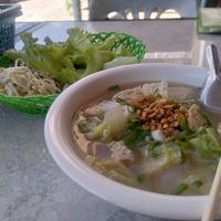 Huge noodle soup with tofu. Complimentary lettuce and sprouts to add to the soup. at LaungXaiKham Restaurant in Vang Vieng