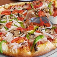 BYO pizza with vegan cheese and a few veggies at Waynesville Pizza Company in Waynesville