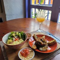 vegan falafel plate with juice at Oh La La in Cartagena