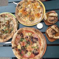 Clockwise - The one with all the seasons, Truffle mushroom pizza, Seaspiracy special pizza at Purezza Camden in London