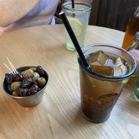 Homemade cola and olives for starter at Purezza Camden in London