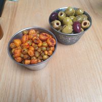 Spiced Corn, Marinated Olives at Purezza Camden in London