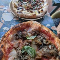 The first one is the Parmigiana pizza and the second one the porkies at Purezza Camden in London