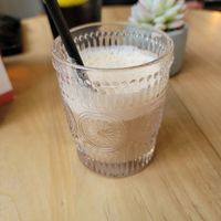 Iced chai tea latte with oat milk at Purezza Camden in London