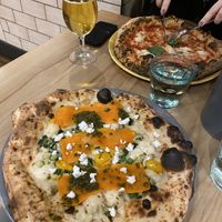 Salmon pizza (front), margherita pizza (back)    at Purezza Camden in London