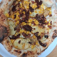 Breakfast pizza at Purezza Camden in London