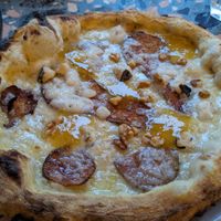 PEAR & BLUE Pizza -- the round things you see are the thinly sliced pear at Purezza Camden in London