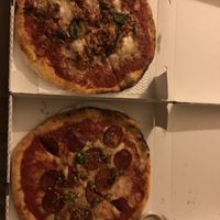 Deliveroo orders to bring purezza deliciousness home. Parmigiana and pepperoni.   at Purezza Camden in London