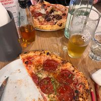 pepperoni pizza + partner’s pizza with mushrooms at Purezza Camden in London