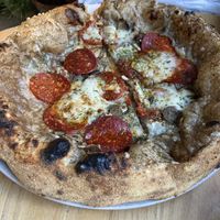 Truffle pizza with extra pepperonii  at Purezza Camden in London
