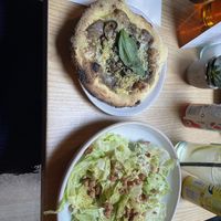 Truffle pizza and Cesar salad (lunch menu option at a smaller size)  at Purezza Camden in London