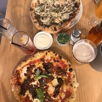Pizza (mushroom and truffle, aubergine)  at Purezza Camden in London