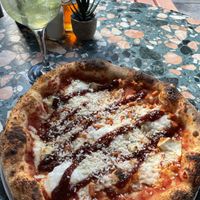 Four cheese pizza and limoncello spritz   at Purezza Camden in London