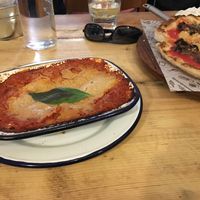 Lasagna and parmigiana pizza at Purezza Camden in London