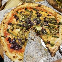 A variety of pizzas, bases, sauces and toppings. at Purezza Camden in London