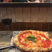 pizza, wine and the view when seated at the „bar" at Purezza Camden in London