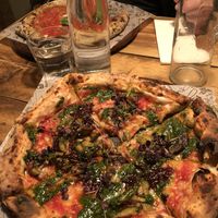 Pesto Manifesto in front, Marinara on back at Purezza Camden in London