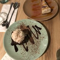 Salted Caramel Brownie with Vanilla ice cream and strawberry cheesecake with mango coulis at Purezza Camden in London