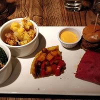 Broccoli with chilli jam, roasted cauliflower with giant cous cous, chickpea tart, moving mountains burger and BBQ jackfruit wrap. at The Church Mouse in Chester-le-street