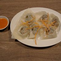 Dumplings with some sort of spicy dipping sauce at Genesis 创世界素食馆 in Central Singapore
