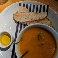 Carrot and coriander soup with vegan oil and bread. at The Castle in Wakefield
