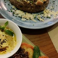 Berenjena en tempura con hummus y risotto de boletis at Hakuna Matata Veggie in Madrid