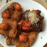 Escalopes vegetales con tumbet mallorquín  at Hakuna Matata Veggie in Madrid