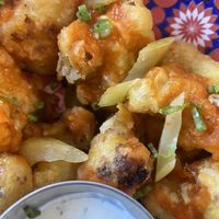 Cauliflower wings with vegan ranch dressing   at Basic Kitchen in Charleston