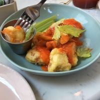 Buffalo Cauliflower Wings with Vegan Ranch Dressing at Basic Kitchen in Charleston