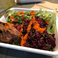 A base of greens, warm sweet potatoes and beet/lentil mix! at Little Beet - Midtown West in New York City