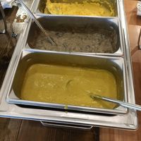 Brunch Buffet: Gravy, grits and cheeze sauce  at Fig + Farro in Minneapolis