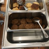 Breakfast Buffet: biscuits (next batch was softer w/o burnt bottoms) and beyond breakfast patties  at Fig + Farro in Minneapolis
